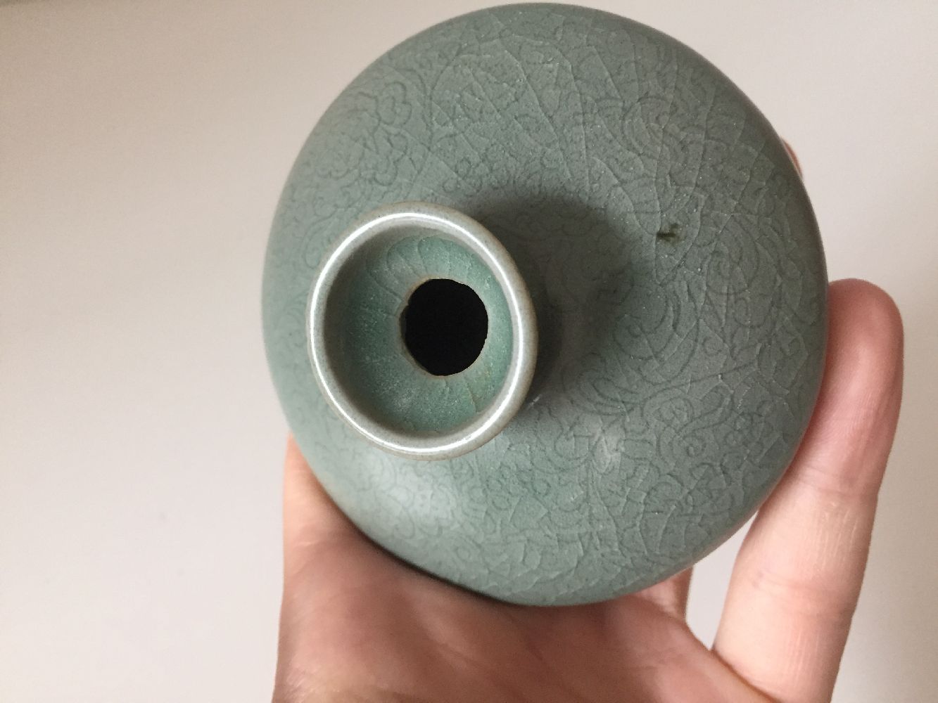 A Korean stoneware celadon oil pot, Goryeo dynasty, of flattened circular form, the exterior - Image 5 of 5