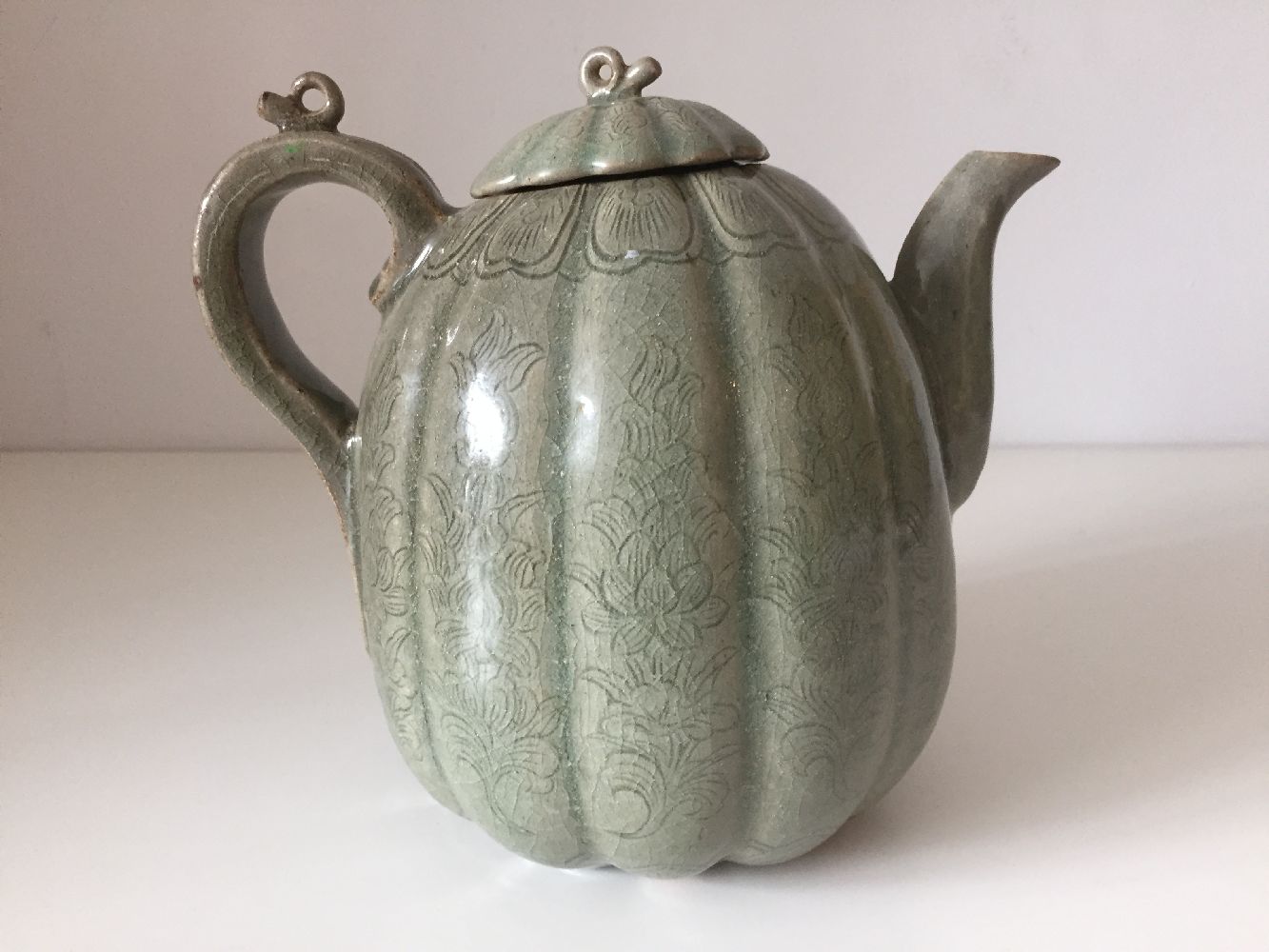 A Korean stoneware celadon melon-shaped teapot, Goryeo dynasty, the lobed body decorated with - Image 4 of 10