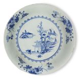 A large Chinese porcelain blue and white dish excavated from the Nanking cargo, 18th century,
