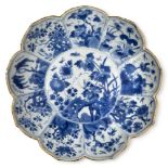 A Chinese blue and white porcelain lotus-shaped dish, Kangxi period, painted with chrysanthemum