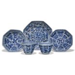 Two pairs of Chinese porcelain blue and white 'peony' hexagonal wine cups and saucers excavated from