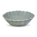 A Chinese ge-type celadon crackle-glazed shallow bowl, Qing dynasty, the bowl with a moulded lotus