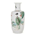 A Chinese porcelain famille verte rouleau vase, 18th/19th century, decorated with a boy presenting a