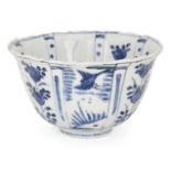 A Chinese porcelain Kraak blue and white 'flying birds' bowl, 17th century, the exterior painted