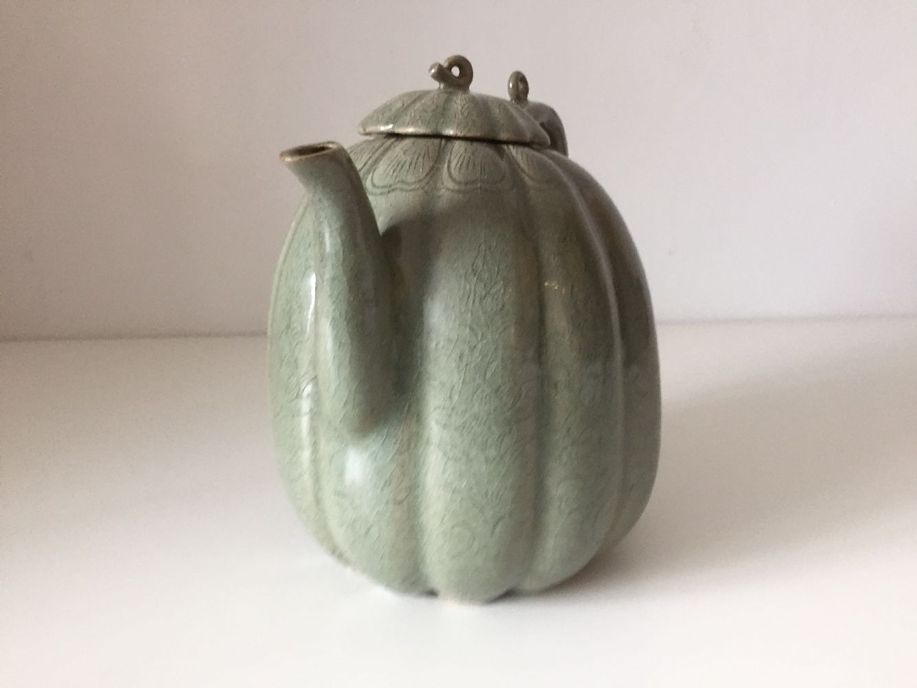 A Korean stoneware celadon melon-shaped teapot, Goryeo dynasty, the lobed body decorated with - Image 5 of 10