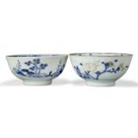 Two Chinese porcelain blue and white 'shipwreck' bowls excavated from the Nanking Cargo, circa 1750,