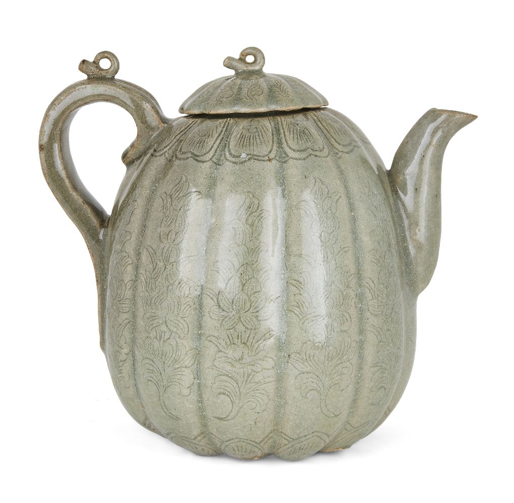 A Korean stoneware celadon melon-shaped teapot, Goryeo dynasty, the lobed body decorated with
