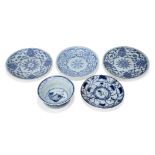 Five pieces of Chinese blue and white porcelain, 19th century, comprising four saucer dishes