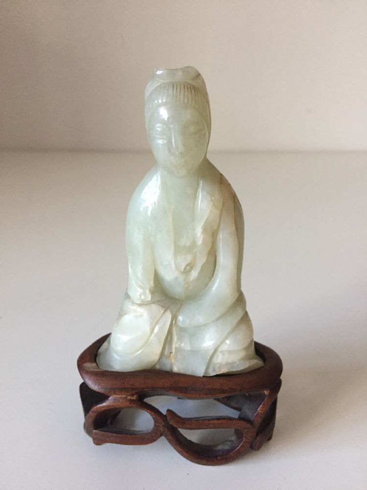 A Chinese pale green jade ‘Guanyin’ carving, 19th century, carved seated with her long robes wrapped - Image 3 of 9