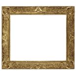 A Carved and Gilded Composition Louis XV Style Pierced and Swept frame, late 19th/early 20th