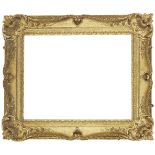 A French Carved and Gilded Louis XV Style Swept and Pierced Frame, early-mid 19th century, with leaf