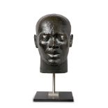 A modern bronze bust of a man, South African, signed G, SCS foundry, edition 2/8, on contemporary
