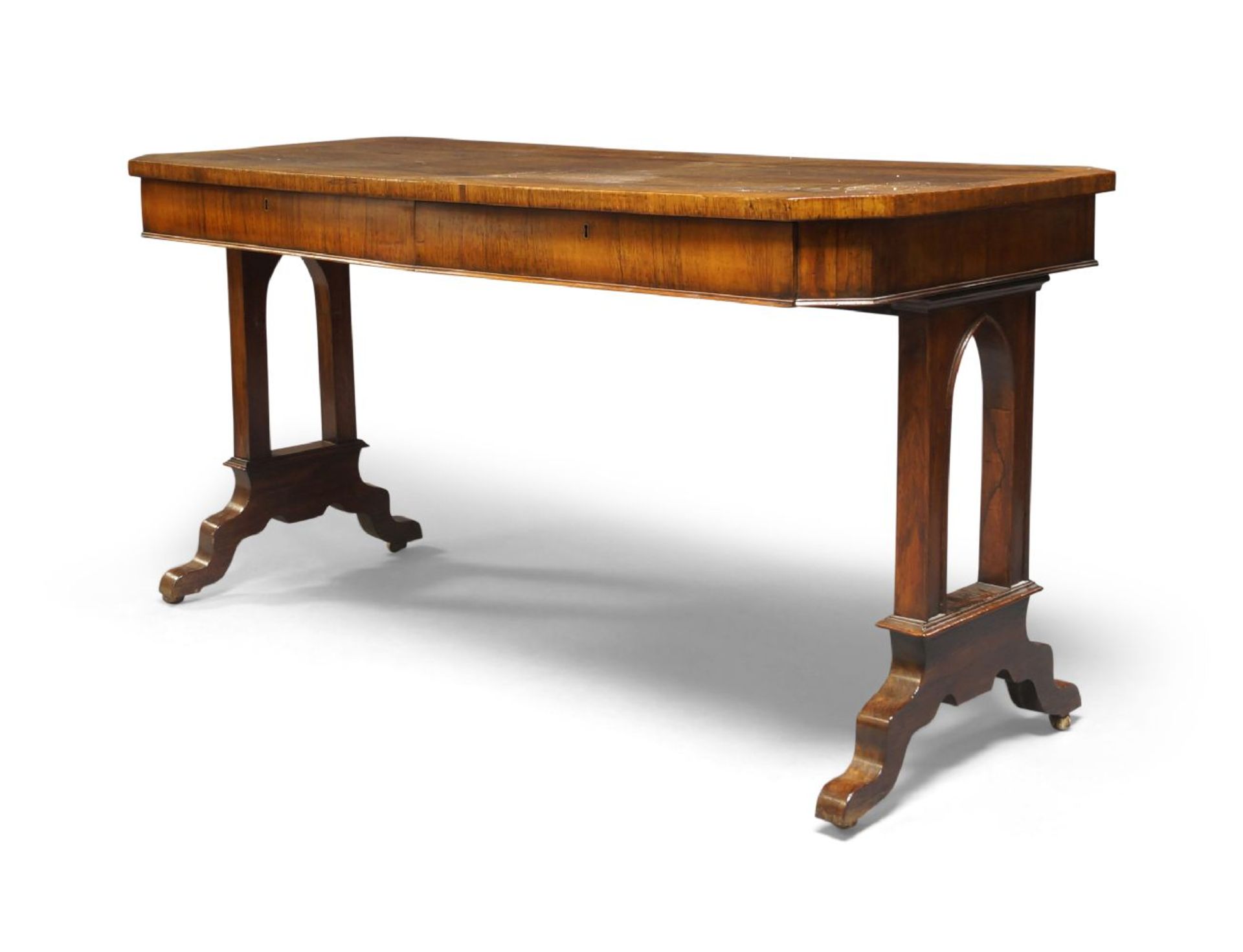 A William IV rosewood and cross-banded library table, the top with a cross-banded edge and canted