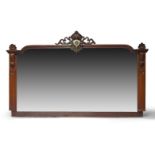 A large Victorian mahogany over-mantel mirror, applied mouldings throughout, carved corbels and