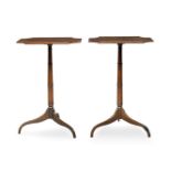 A pair of mahogany tripod occasional tables, 19th century, the shaped oblong tops, raised on