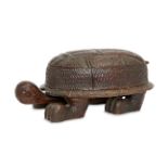 A German Black Forest novelty oak box modelled as a tortoise, 19th century, the hinged lid