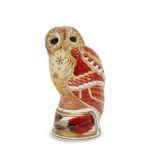 A Royal Worcester porcelain Imari candle snuffer modelled as a tawny owl, from The Connoisseur