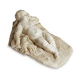 An Italian marble model of the Sleeping Christ Child, late 17th/early 18th century, depicted on a
