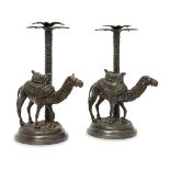 Two bronze candlesticks modelled as camels, late 20th century, possibly by Maitland Smith, each