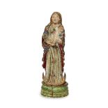 A Goanese polychrome ivory figure of the Virgin and Child, late 17th century, the Child depicted
