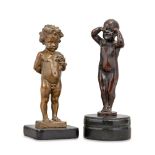 After H Müller, a German bronze model of a boy holding a posy of flowers, late 19th century, with