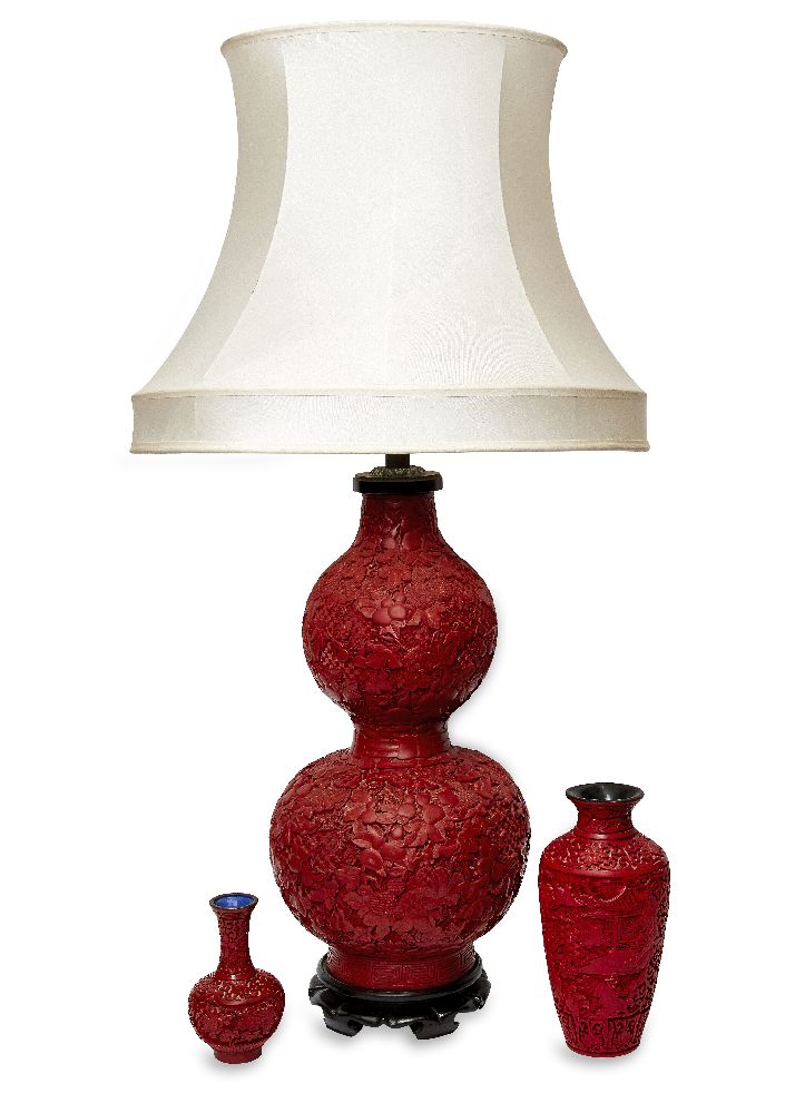A modern large faux cinnabar table lamp, of double gourd form, on a hardwood base, 56cm high