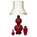 A modern large faux cinnabar table lamp, of double gourd form, on a hardwood base, 56cm high