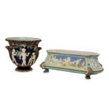 A Victorian Copeland majolica jardiniere, late 19th century, decorated with vintager boys, the
