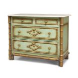 A modern painted and parcel gilt pine chest, with faux bamboo moulding and marble top (damaged),