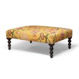 A George Smith contemporary floral upholstered footstool, large proportions, the fabric with a