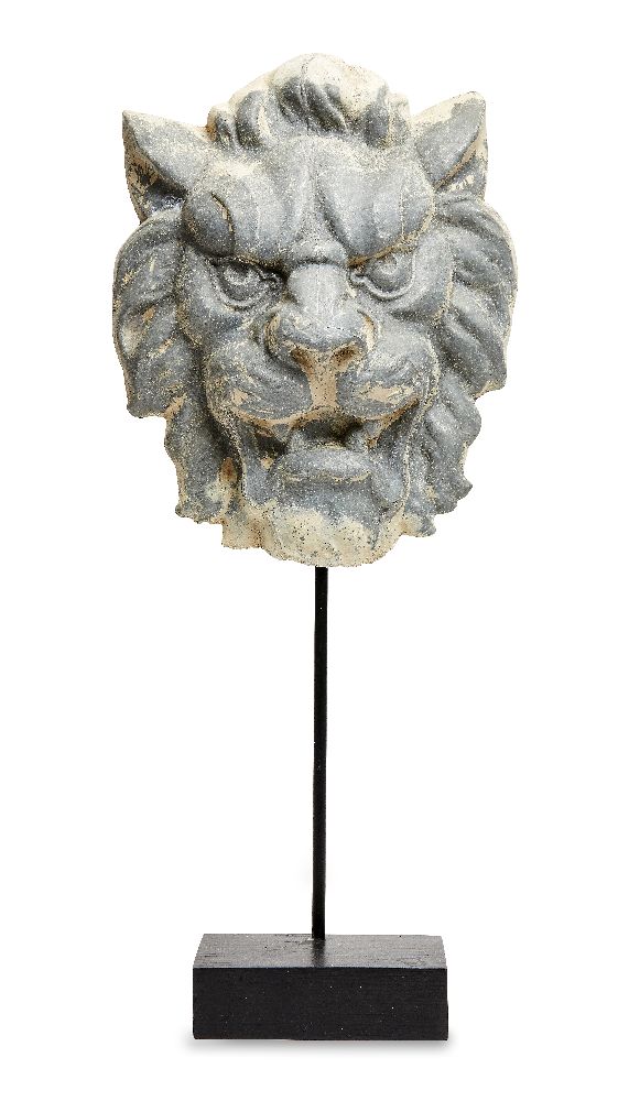 A French repousse zinc lion mask, 19th century, on modern stand, 43cm high overallTraces of old