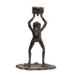 A modern bronze model of a standing frog, with arms aloft supporting a lily pad bowl, 47cm highThe