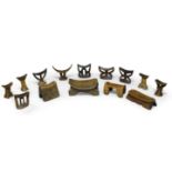 A quantity of African tribal headrests, 20th century, each in carved wood, of various forms and