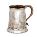 A George III silver tankard, London, c.1773, maker's mark rubbed (?K), of tapering cylindrical form,