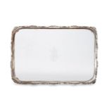 A Victorian glass tray with shaped silver rim, London, c.1889, Hukin & Heath, of rectangular form,