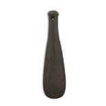 A Māori stone patu onewa/hand club, 19th century, of spatulate form, the grooved butt with a