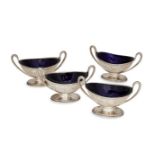 A set of four William IV silver salts, London, c.1835, maker JA, of oval form with reeded twin