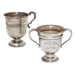 A large twin-handled silver trophy cup, Sheffield, c.1931, Walker & Hall, the body with presentation