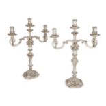 A pair of Asprey & Co. silver three light candelabra, London, c.1965, convertible to candlesticks,