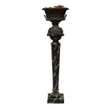 A bronzed jardinière, early 20th century, of oval form, the body cast with a procession of putto,