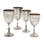 A group of four silver trophy cups, various marks including London, c.1890, and Birmingham, c.