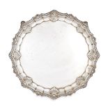 A George V silver salver, London, c.1911, Searle & Co., of shaped, circular form with shell and