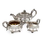 A George IV three piece silver tea set, London, c.1824 and 1825, Rebecca Emes & Edward Barnard,