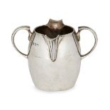 A double lipped Victorian silver cream jug, London, c.1890, George Fox, the fluted lips to a