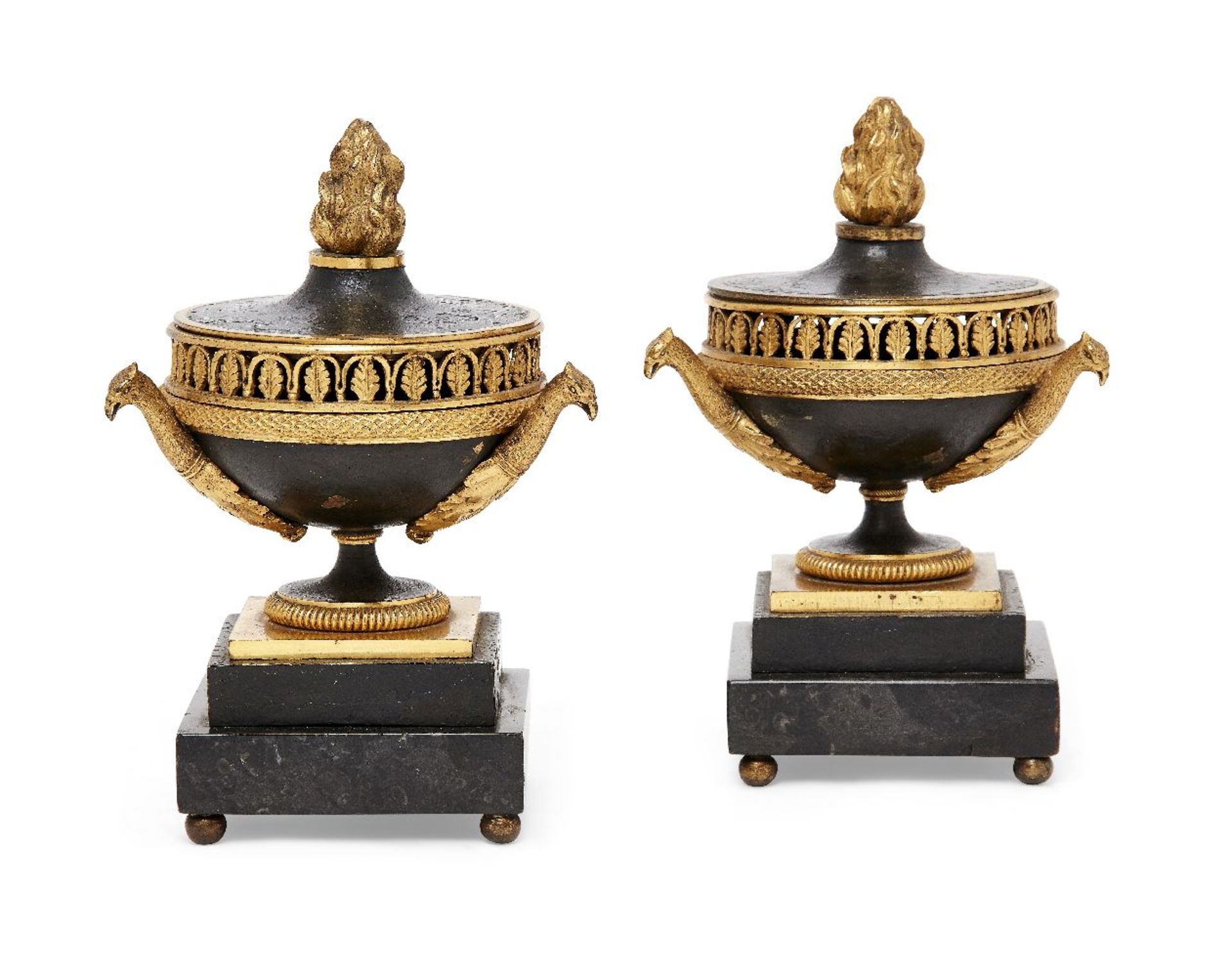 A pair of Empire ormolu and patinated bronze brule-perfums, early 19th century, each of urn form