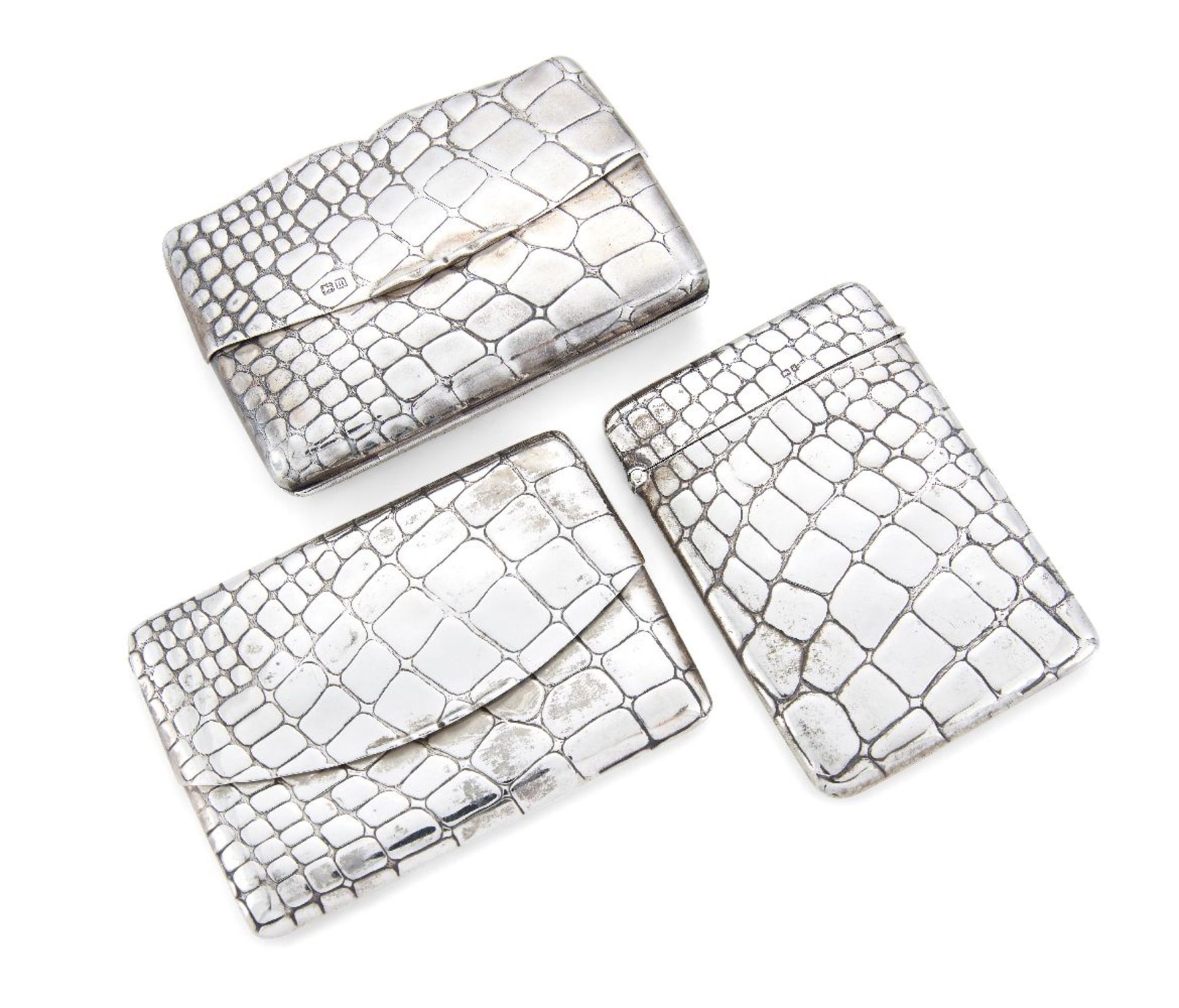 An Edwardian silver purse by Sampson Mordan, London, c.1907, the textured silver designed to