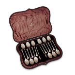 A cased set of Victorian silver teaspoons with sugar tongs, Sheffield, c.1890, Atkin Brothers, the