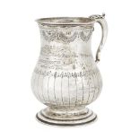 A Victorian silver tankard, London, c.1872, Henry Holland, the baluster body engraved with