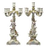 A pair of Continental Meissen-style porcelain five-light candelabra, late 19th century, unmarked,