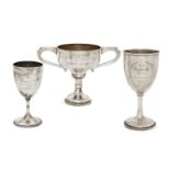 A twin-handled trophy cup, London, c.1933, Charles Kain, designed with wide angular handles and